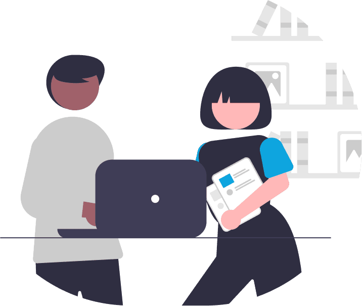 Two people looking at a laptop